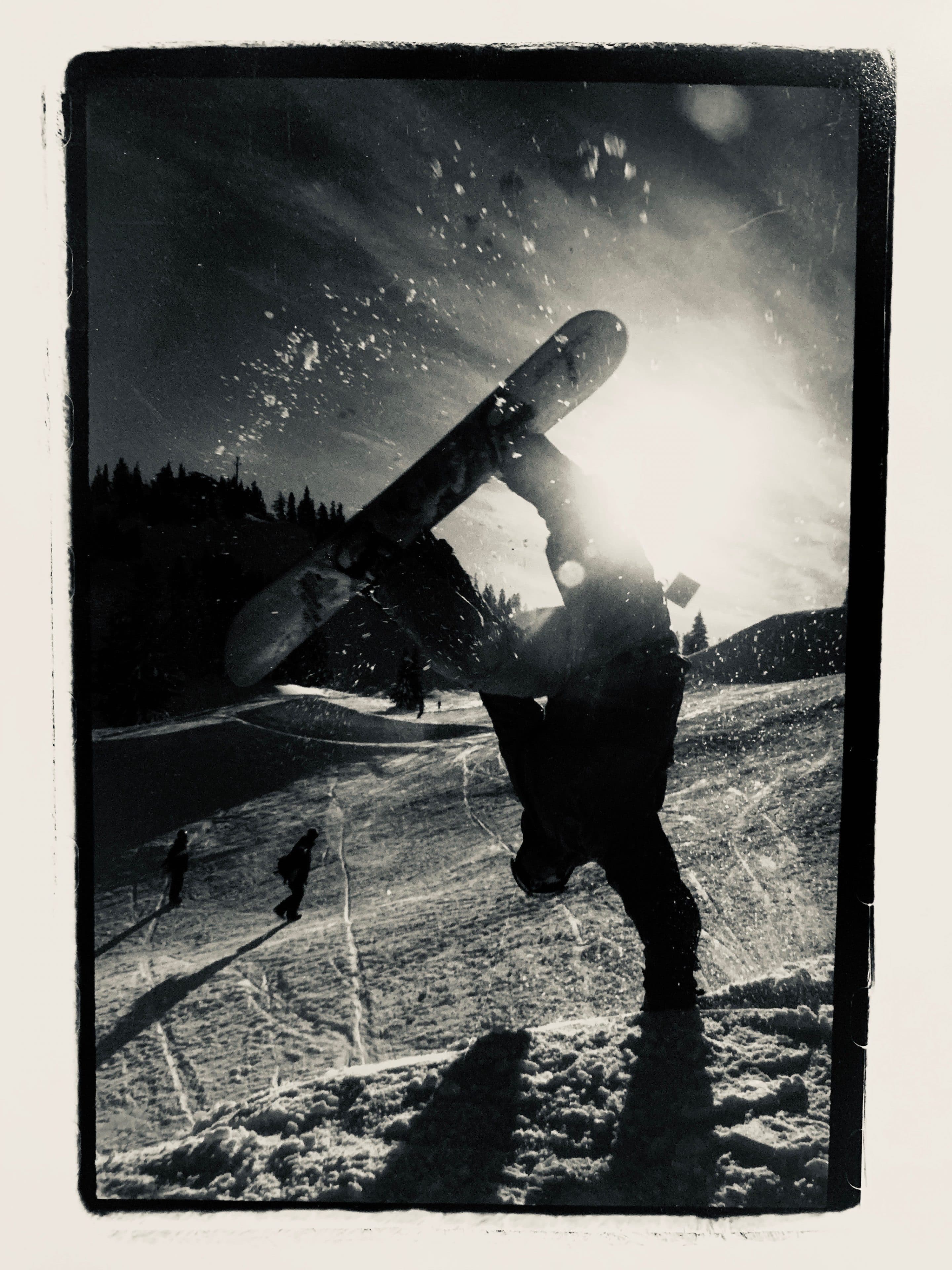 Dr. Iversen does a sick snowboarding trick on a ski slope in Washington.